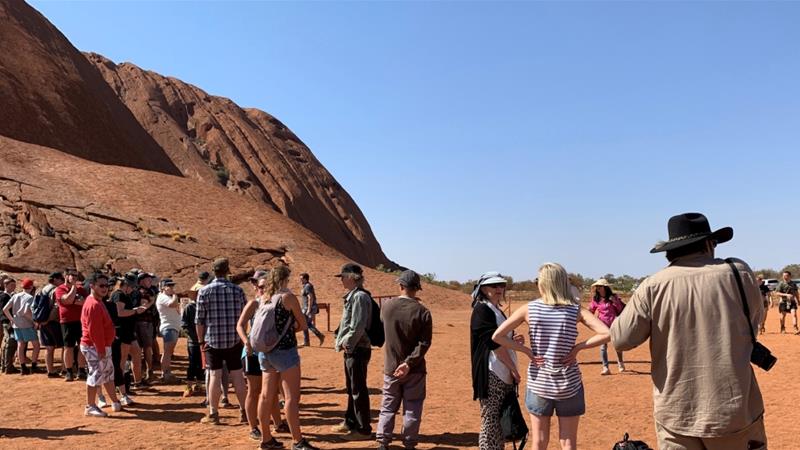 The local Anangu community has been asking visitors not to climb Uluru since 1985 when the government handed back the land title to it [Stefica Bikes/Reuters]