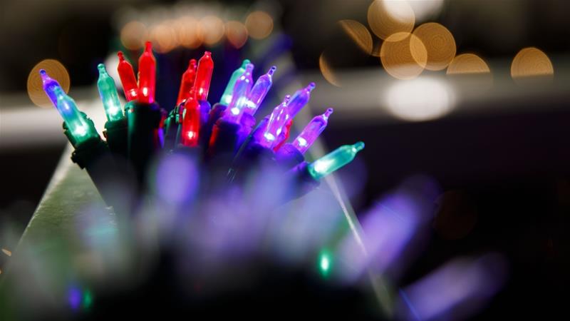 For many years Christmas lights were produced almost solely in China, but increased US tariffs on Chinese goods pushed many buyers to source the items elsewhere, including Vietnam [File: Patrick T. Fallon/Bloomberg]