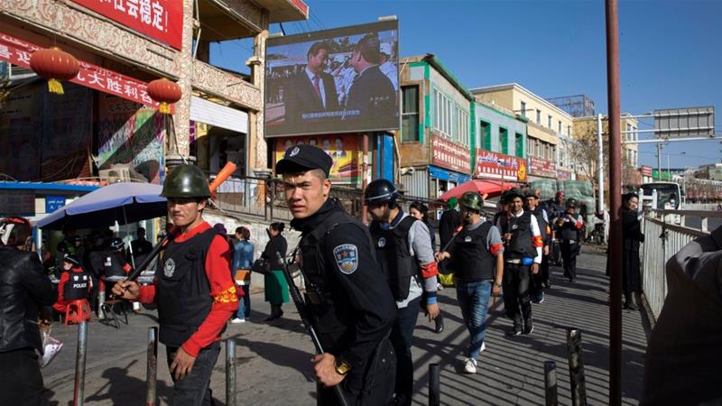 The Uighur Act of 2019 requires the US president to condemn abuses against Muslims and call for the closure of Xinjiang's detention camps [File: Ng Han Guan/AP]