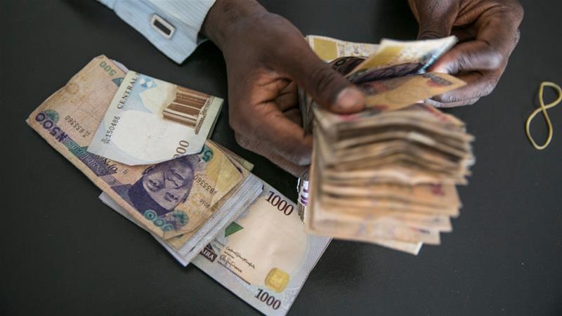 Nigeria's new budget paves the way for the country's likely return to the international debt market next year as it struggles to shake off the impact of a recession [File: Jean Chung/Bloomberg]