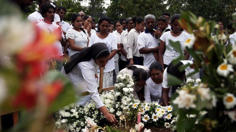 Sri Lanka revises bombings death toll down by 100