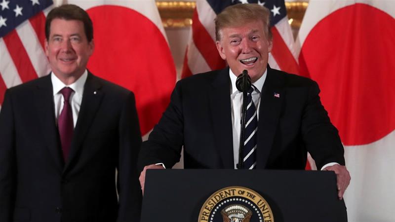 Trump's first event after arriving in Tokyo was a reception with several dozen Japanese and American business leaders at the US ambassador's residence [Jonathan Ernst/Reuters]