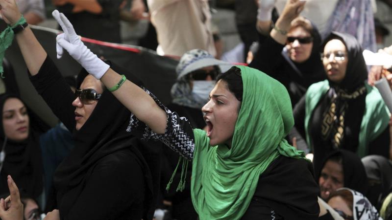 Iranian protesters flash victory signs during a protest after Friday prayers at a university in Tehran on July 17, 2009 [File: Reuters]