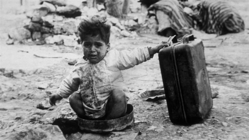 A Palestinian child refugee at a camp in Palestine in November 1948 [Getty Images]