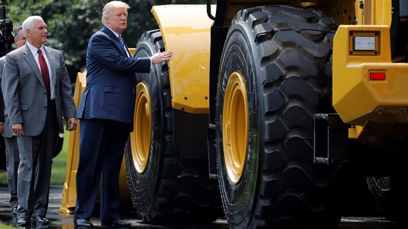 To protect its profits from tariffs, Deere & Co has cut costs and increased prices - with an estimated $100m increase in the cost of its raw materials this year [Carlos Barria/Reuters]