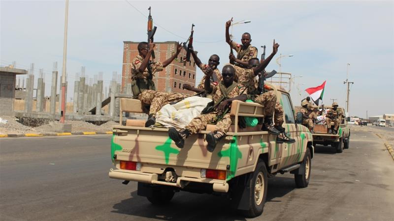 Sudanese soldiers on a military vehicle gesture as they arrive to the port city of Aden, Yemen on November 9, 2015 [File: AP/Wael Qubady]