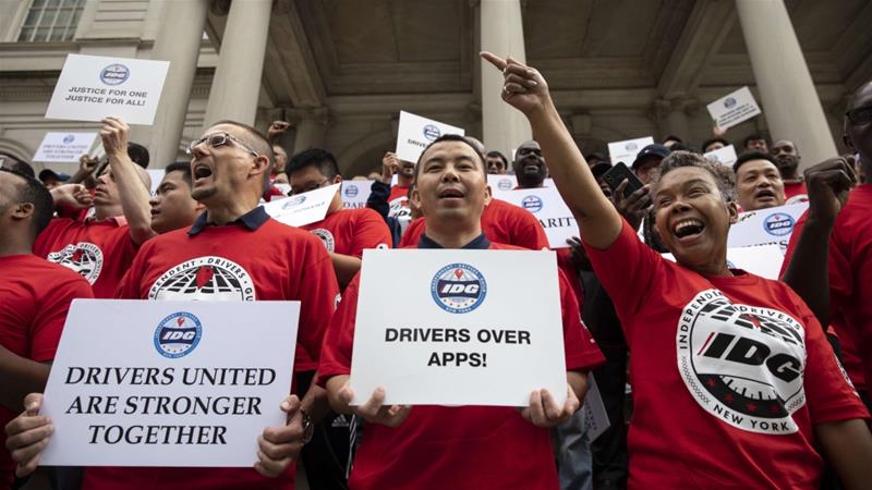 Drivers in California and many other states, such as New York, have lobbied for better pay and benefits from ride-hailing companies [Drew Angerer/Getty Images/AFP]