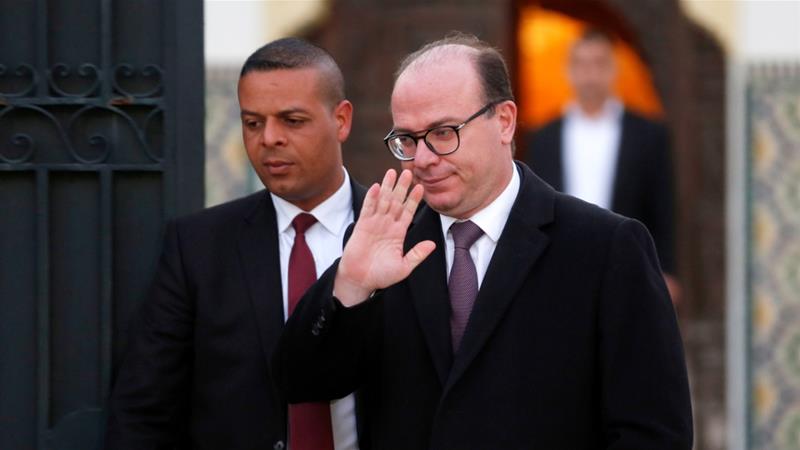 Tunisian Prime Minister Elyes Fakhfakh leaves for a meeting with Tunisian President Kais Saied in Tunis, Tunisia February 15, 2020 [Zoubeir Souissi/ Reuters]