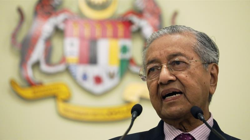 Malaysia's former Prime Minister Mahathir Mohamad, who resigned from his post in a shock move in February, said of his successor: 'This is the wrong time to take over the government ... The country has never been in such a state before.' [File: Lim Huey Teng/Reuters]