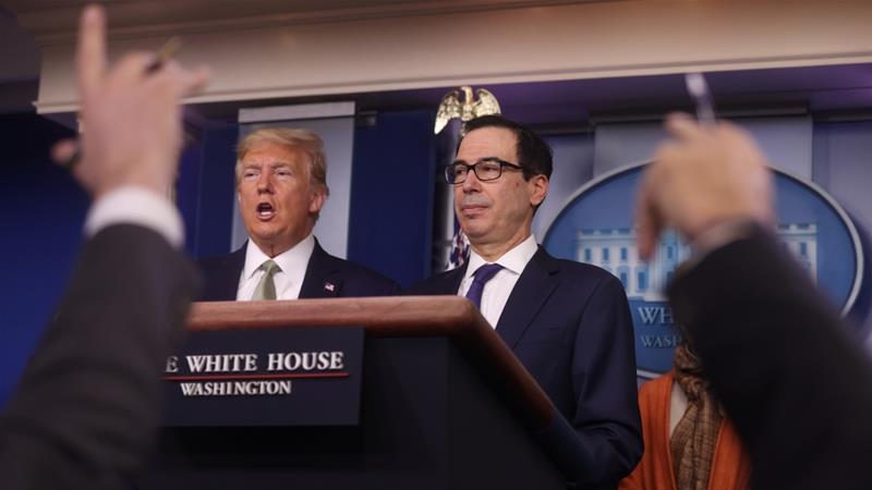 US President Donald Trump and Treasury Secretary Steven Mnuchin answer questions during the Trump administration's daily coronavirus briefing at the White House in Washington, US [File:Jonathan Ernst/Reuters]