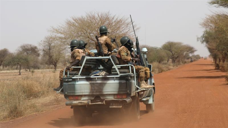 Soldiers from Burkina Faso patrol along a Gorgadji road in the Sahel area of Burkina Faso [File: Luc Gnago/Reuters]