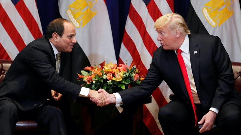 US President Donald Trump shakes hands with Egypt's President Abdel Fattah el-Sisi as they hold a bilateral meeting in New York, US, September 24, 2018 [Carlos Barria/Reuters]