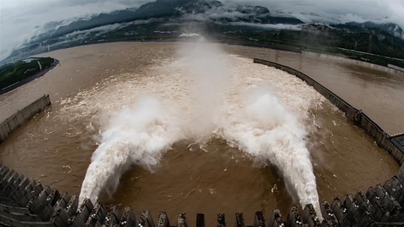 The Three Gorges Dam on the Yangtze River discharges water to lower the water level in the reservoir following heavy rainfall in July [China Daily via Reuters]