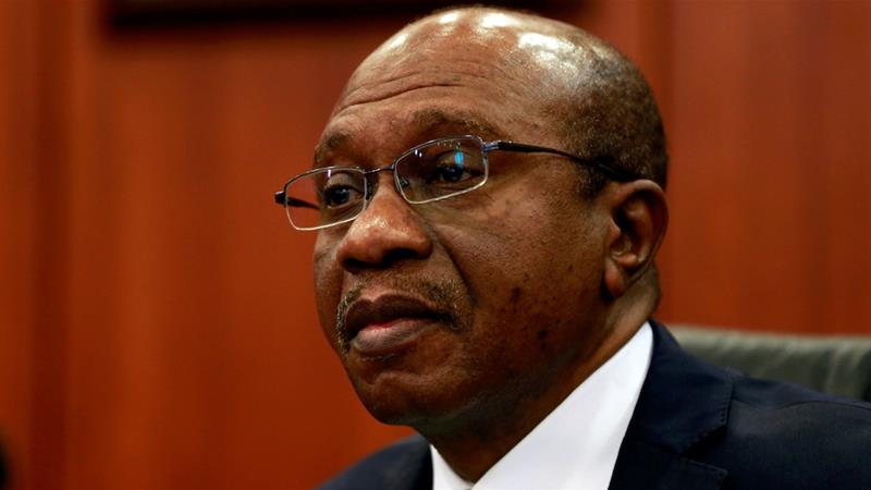 Nigeria's Central Bank Governor Godwin Emefiele told a briefing in Nigeria's capital Abuja on Tuesday that of the 10 members who attended the policy-setting committee meeting, six voted to cut interest rates [File: Afolabi Sounde/Reuters]