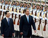 Blair (R) with Wen (L) vowedto produce peaceful world
