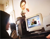 An Iranian girl gets her news through the Internet