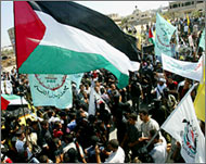 Arafat's supporters rally in Khan Younis refugee camp, Gaza Strip