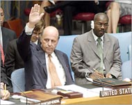 US envoy John Negroponte blocksthe UN motion defending Arafat