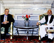 Rumsfeld and Karzai hope to lessen Fahim's influence in Kabul