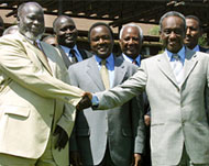 Kenyan Foreign Minister Musyoka(C) is playing host to the talks 