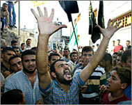 Mourners condemn Israel duringthe funerals of Hamas activists 