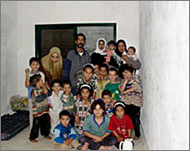 Forty members of Linda al-Absi'sfamily are living in a single room