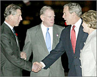 Prince Charles (L) greets Bush asthe latter starts a four-day visit