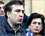 Georgian opposition leader Saakashvili (L), and caretaker president Burjanadze