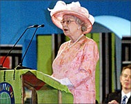Elizabeth II addresses delegates as Britain's Tony Blair  listens