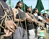 Members of  a Muslim group with boundhands at a New Delhi demonstration  
