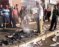 A newspaper office is attacked bypro-Mugabe supporters in Harare