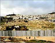 Sharon vowed to speed up building of the apartheid wall 