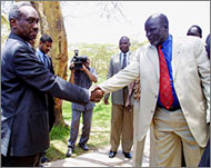 Sudans vice-president Ali Osman and Garang  at earlier peace talks 