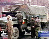 The military truck damaged in blast being examined 