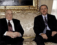 Tayyip Erdogan (R) has been accused of betraying Turkish Cypriots 
