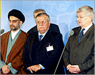 Iranian backed IGC members al-Hakim (L) and Jalal Talabani (C)