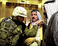 A US soldier argues with Iraqi leaders after al-Aaraji's detention