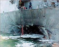 The damaged destroyer USS Cole in Yemen