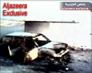 The burnt car belonging to the two Americans killed in Falluja