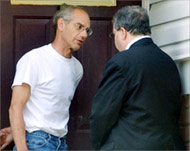 Michael Berg (L) questioned official US statements on his son