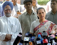 Singh (L) stepped forward when Sonia Gandhi (R) declined the post