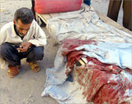 A blood-soaked sheet is evidenceof the mortar strike in Basra