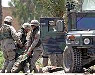 
US forces evacuate wounded comrades from near Sadr CityUS forces evacuate wounded comrades from near Sadr City
