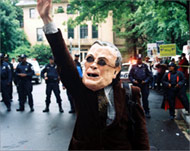 Protesters accused Rumsfeld andBush of international terrorism