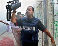 A Reuters television cameramanwas injured by Israeli fire
