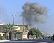 Smoke rises from a Falluja houseafter a US air strike