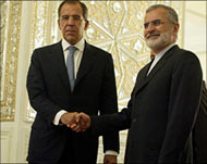 Lavrov (L) is pressing for Iran'sincreased work with the IAEA