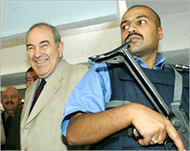 Allawi (L) toured Sadr City afteran earlier visit to Samarra
