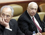Peres (L), served as Sharon's foreign minister from 2001-2002
