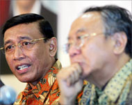 Wiranto (L) apologised for offences by soldiers